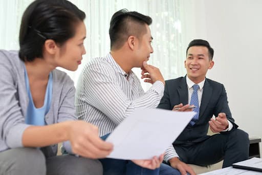 mortgage advisor discussing with clients