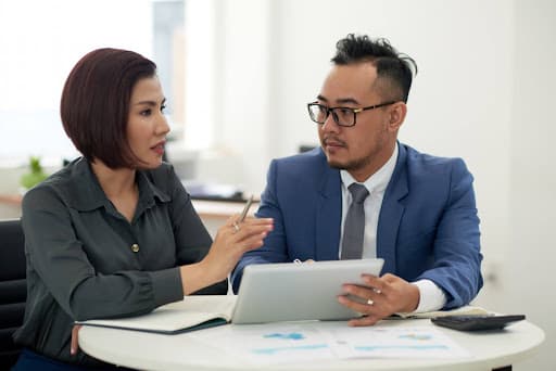 mortgage advisor discussing with a client their loan package options